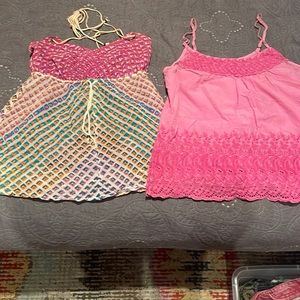 Two Festival Tanks. O’Neill and Aerie.